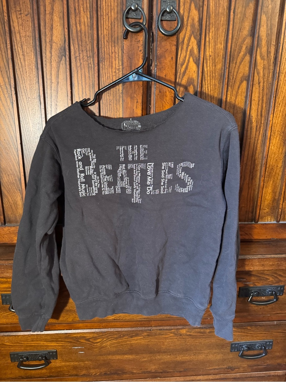 Black Crewneck Sweatshirt with White Text Graphic